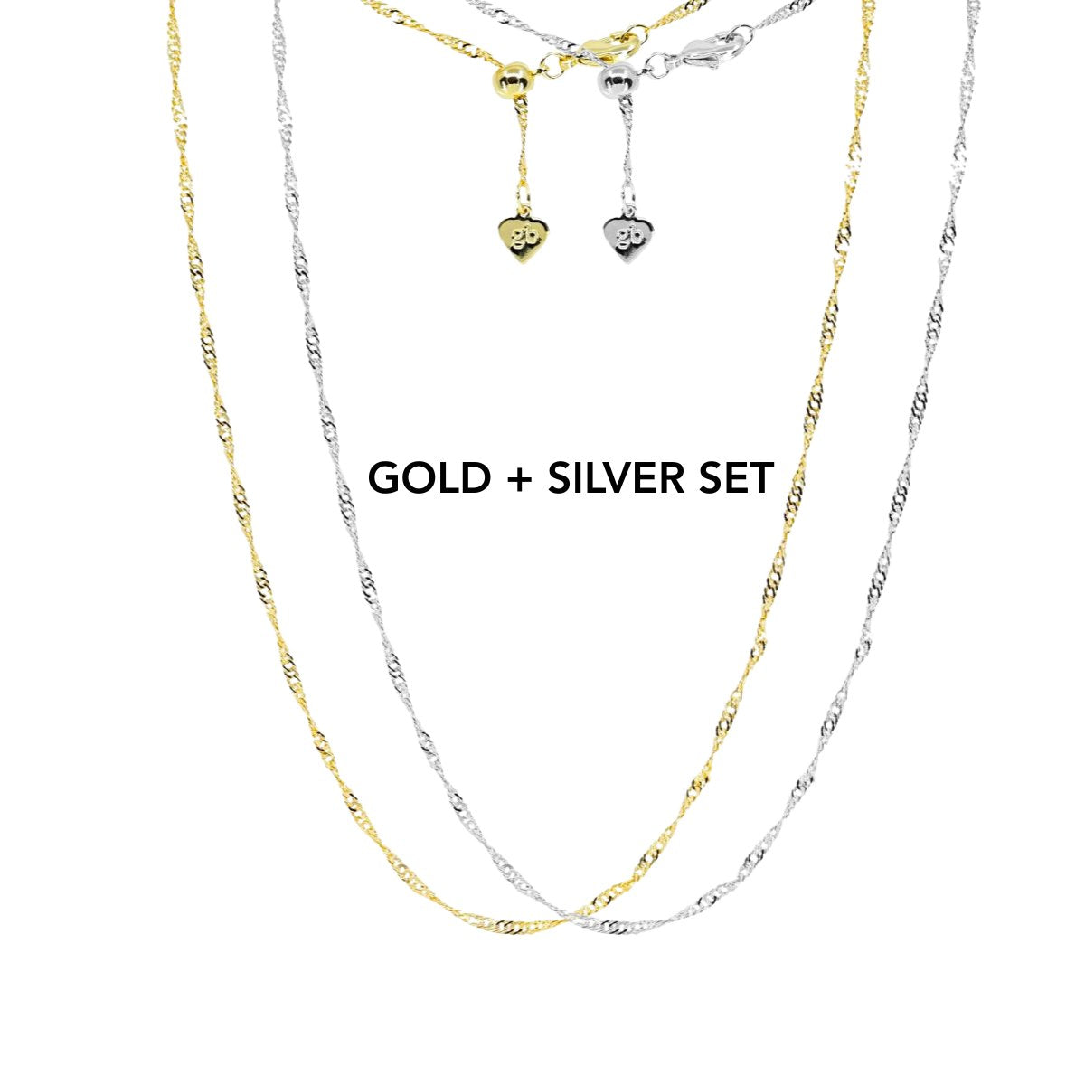 The Addie Adjustable Set, one gold chain and one silver chain, laid at two lengths
